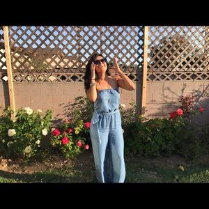 Blue denim colored jumpsuit.